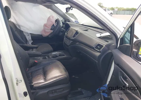 2019 Honda Pilot Touring z USA, uszkodzony, nr VIN 5FNYF6H95KB018182